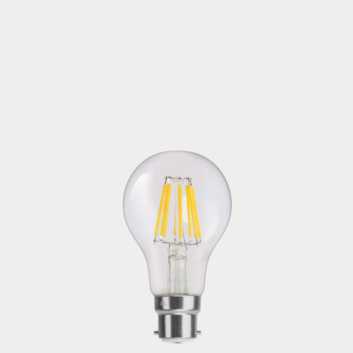 Dulora 8W 12-24 Volt AC/DC GLS LED Bulb B22 Clear in Warm White with filaments visible through clear A60 glass