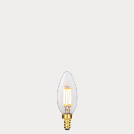 Dulora 4W Candle LED Bulb E12 Clear in Extra Warm filaments glowing