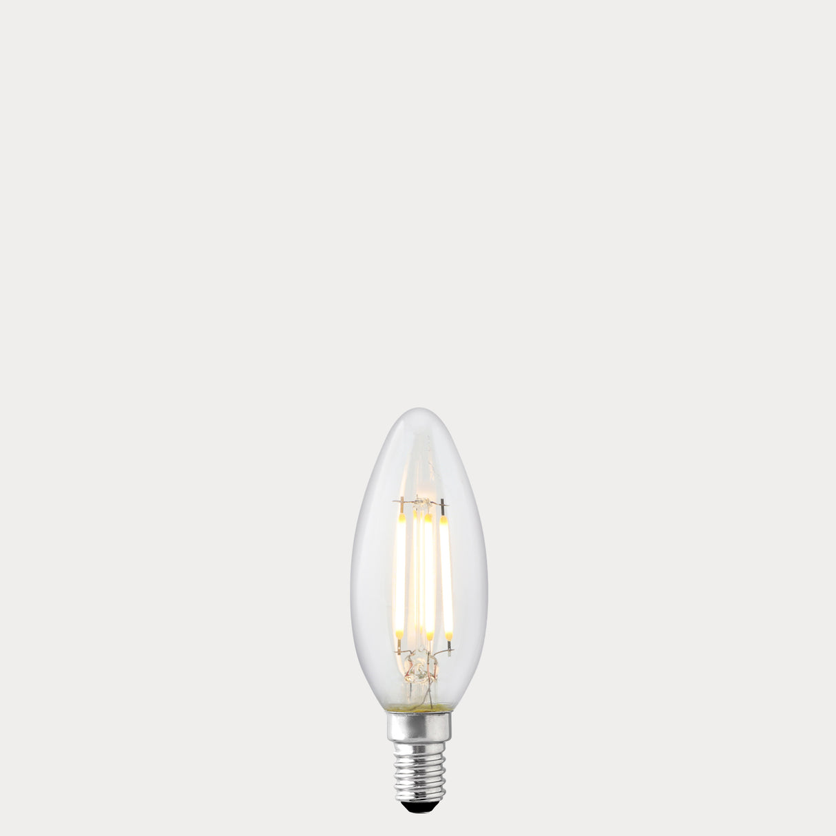 Dulora 4W Candle LED Bulb E14 Clear in Soft White filaments glowing soft white 3000K