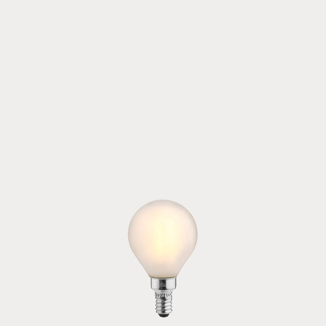 Dulora 4W Fancy Round LED Bulb E12 Frost in Warm White emitting soft even glow through frosted round glass