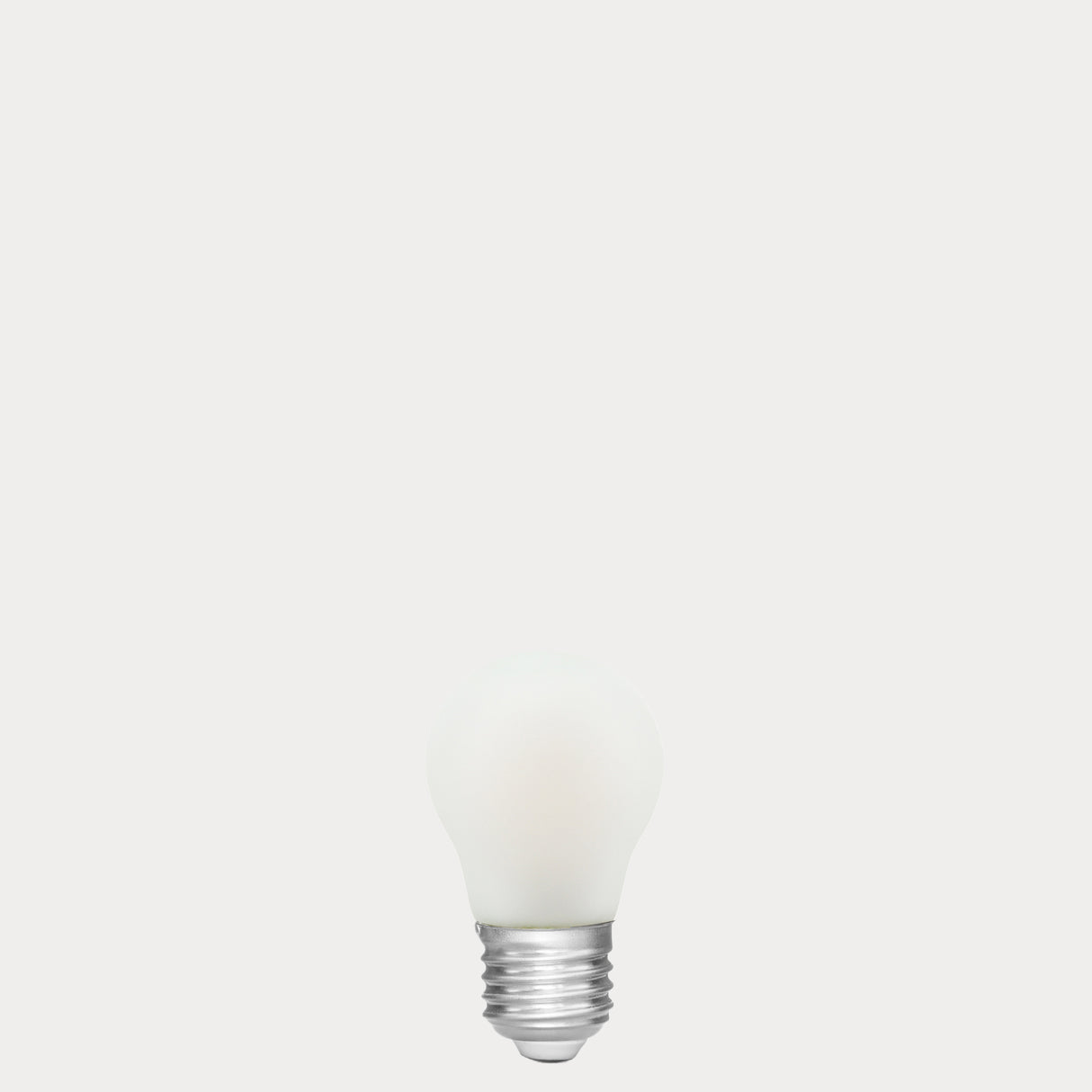 Dulora 4W Fancy Round LED Bulb E27 Porcelain in Warm White unlit showing smooth opal glass