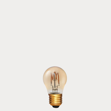 Dulora 4W Vintage Fancy Round LED Bulb E27 Amber in Ultra Warm White unlit with spiral filament amber glass