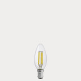Dulora 5.5W Candle LED Bulb B15 Clear in Natural White unlit with visible filaments
