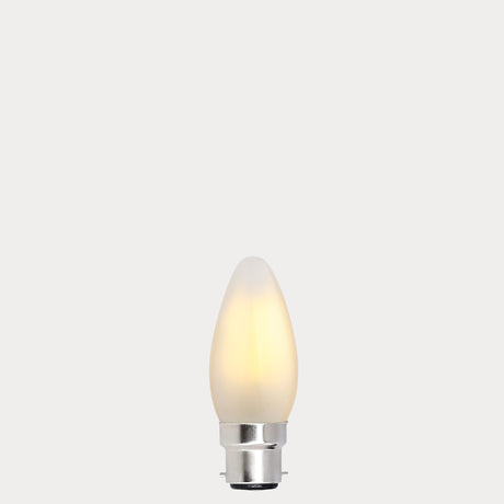 Dulora 5.5W Candle LED Bulb B22 Frost in Warm White illuminated
