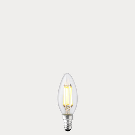 Dulora 5.5W Candle LED Bulb E12 Clear in Warm White filaments glowing