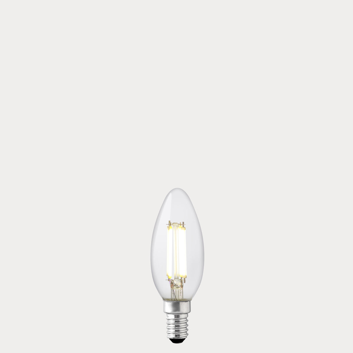 Dulora 5.5W Candle LED Bulb E14 Clear in Natural White filaments glowing
