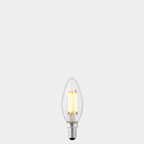 Dulora 5.5W Candle LED Bulb E14 Clear in Warm White filaments glowing