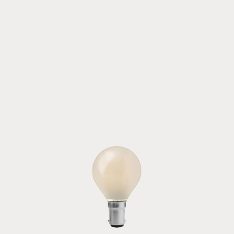 Dulora 5.5W Fancy Round LED Bulb B15 Frost in Warm White unlit showing matte diffused glass