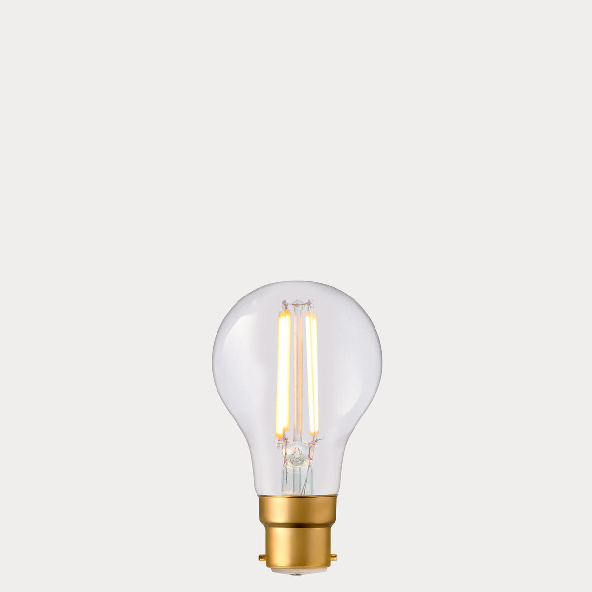 Dulora 6.5W GLS LED Bulb B22 Clear in Extra Warm filaments glowing
