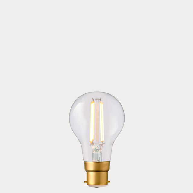 Dulora 6.5W GLS LED Bulb B22 Clear in Extra Warm filaments glowing