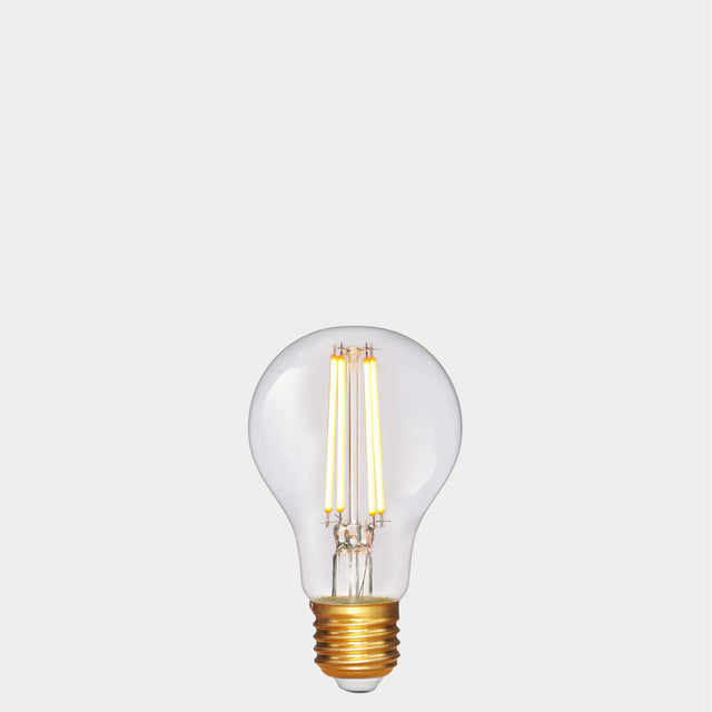 Dulora 6.5W GLS LED Bulb E27 in Extra Warm White filaments glowing extra warm white gold base