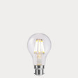 Dulora 8W 12-24 Volt AC/DC GLS LED Bulb B22 Clear in Warm White illuminated with warm glow through clear A60 glass
