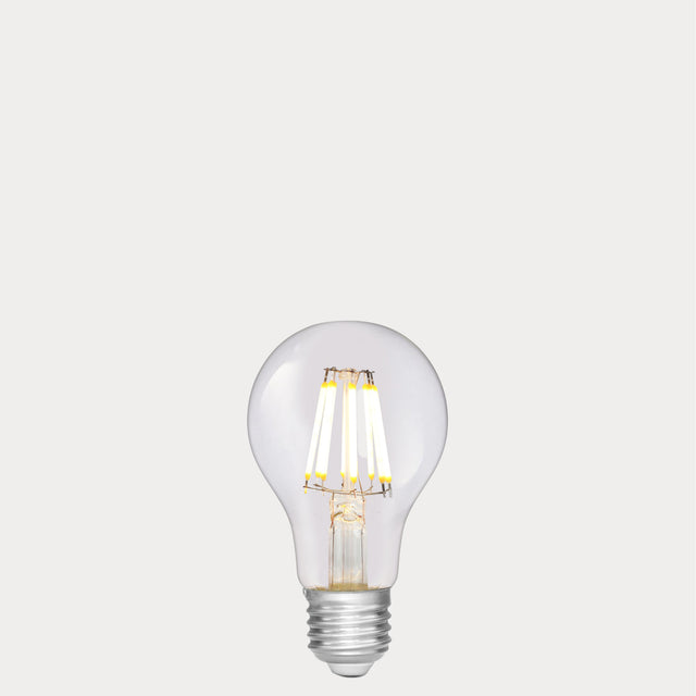 Dulora 8W 12-24 Volt AC/DC GLS LED Bulb E27 Clear in Warm White illuminated with warm glow through clear A60 glass